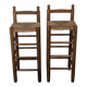 High wooden and straw stools