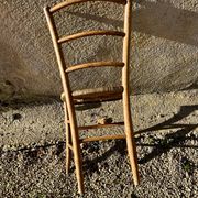 Chaise paillée vintage dorée