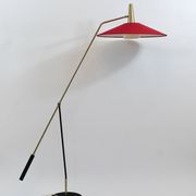 Articulated floor lamp with counterweight mid-century by Rupert Nikoll, nickel, brass.