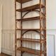 Tall rattan shelf