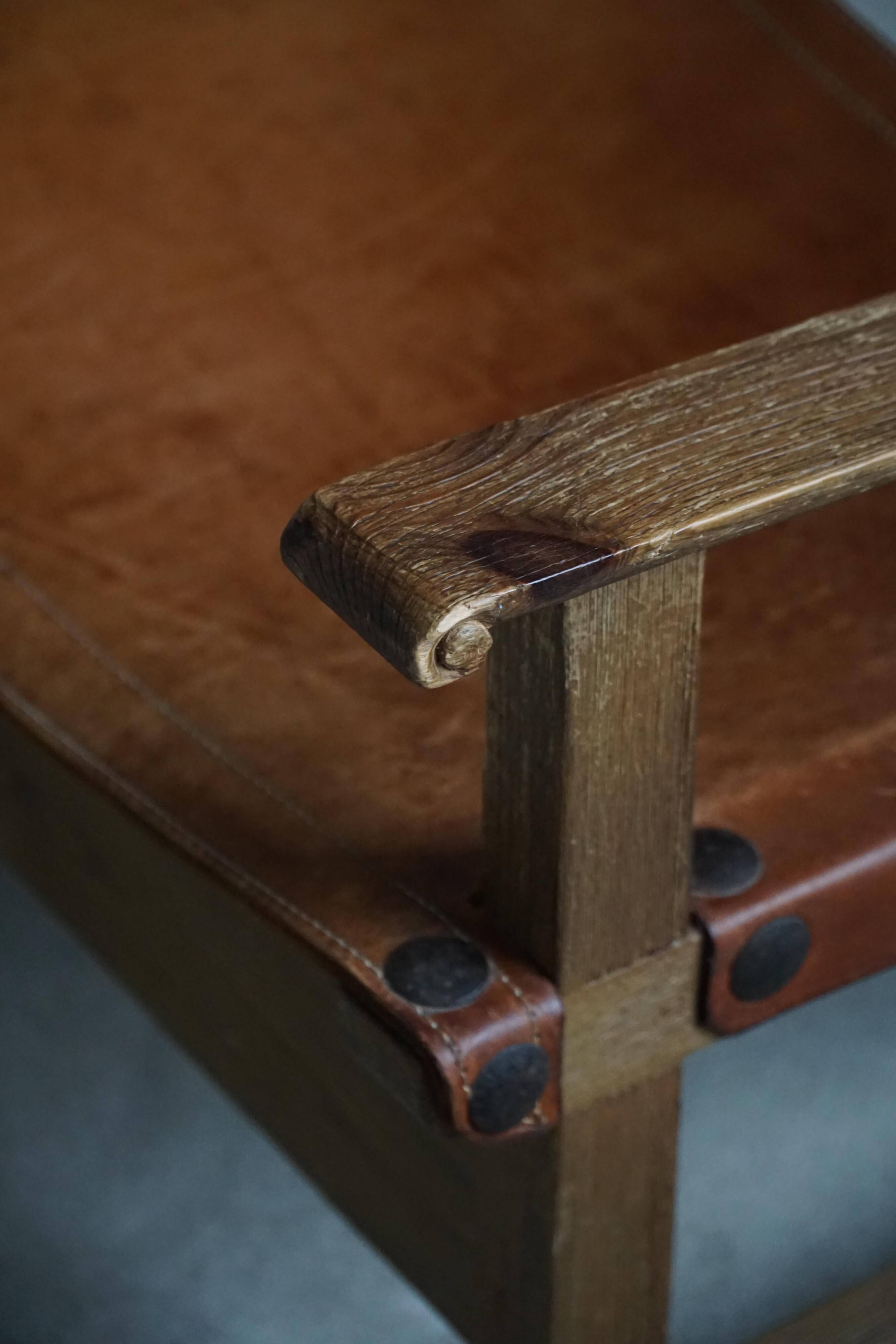 Pair of Spanish brutalist armchairs from the 1960s, wood and leather.