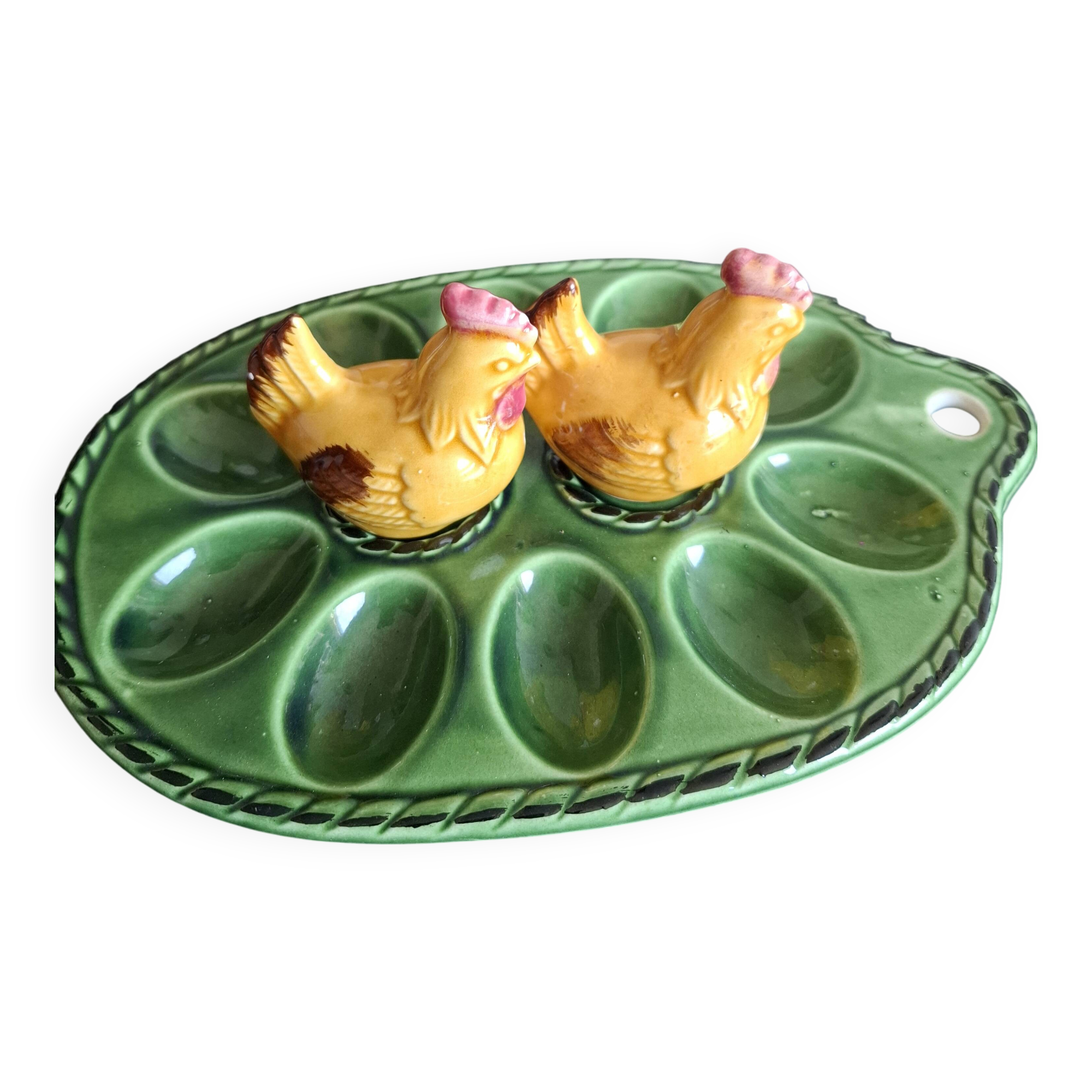 Earthenware egg dish with chicken-shaped salt and pepper shakers