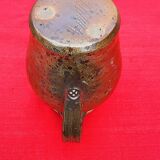 Pitcher pitcher in speckled sandstone signed