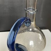 Vintage carafe in blown and bubbled glass paste.