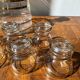 Gold-rimmed decanter and liqueur glass service