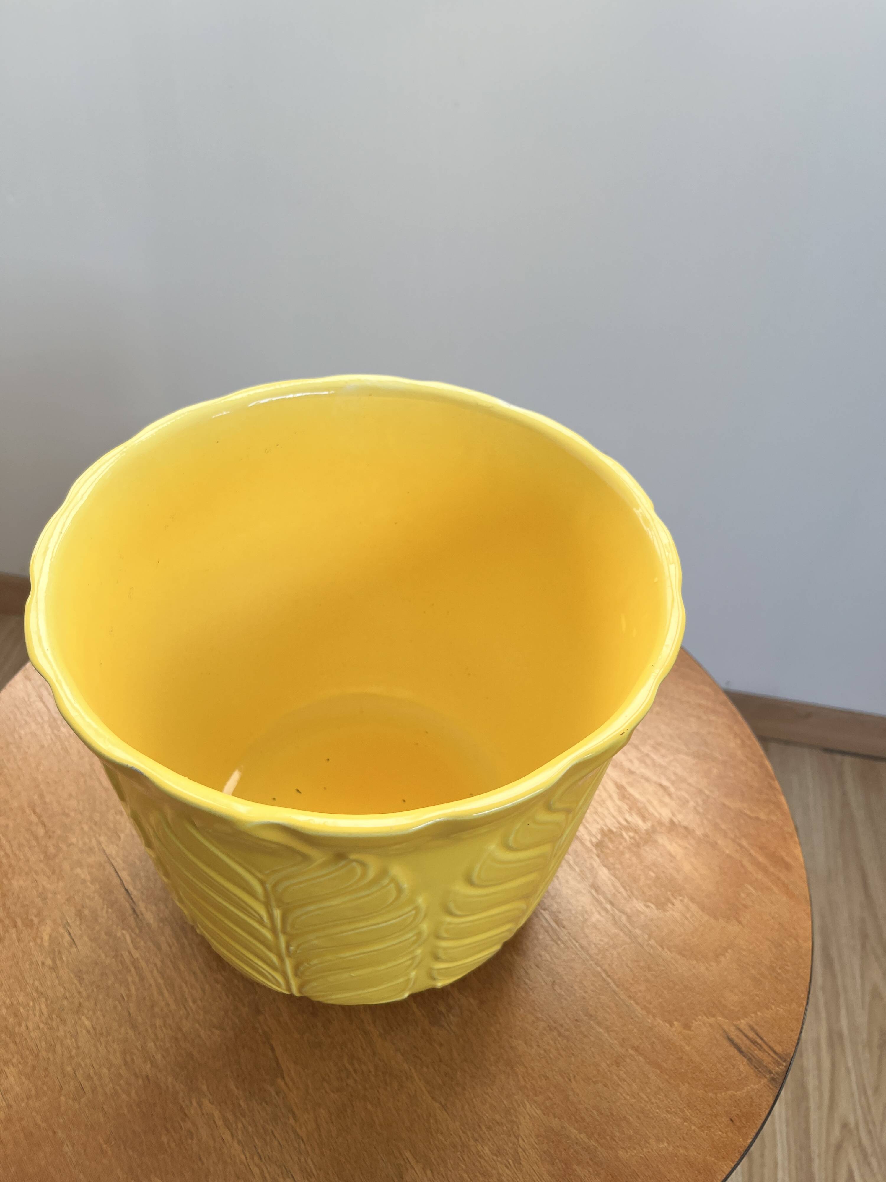 Yellow ceramic plant pot