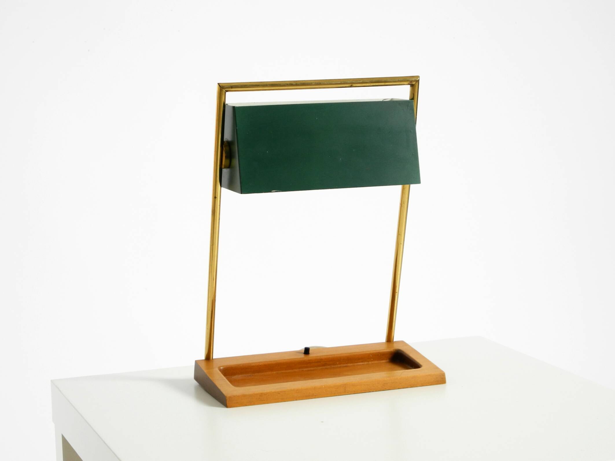 1960s Temde table lamp with a brass frame, teak base, and green lampshade