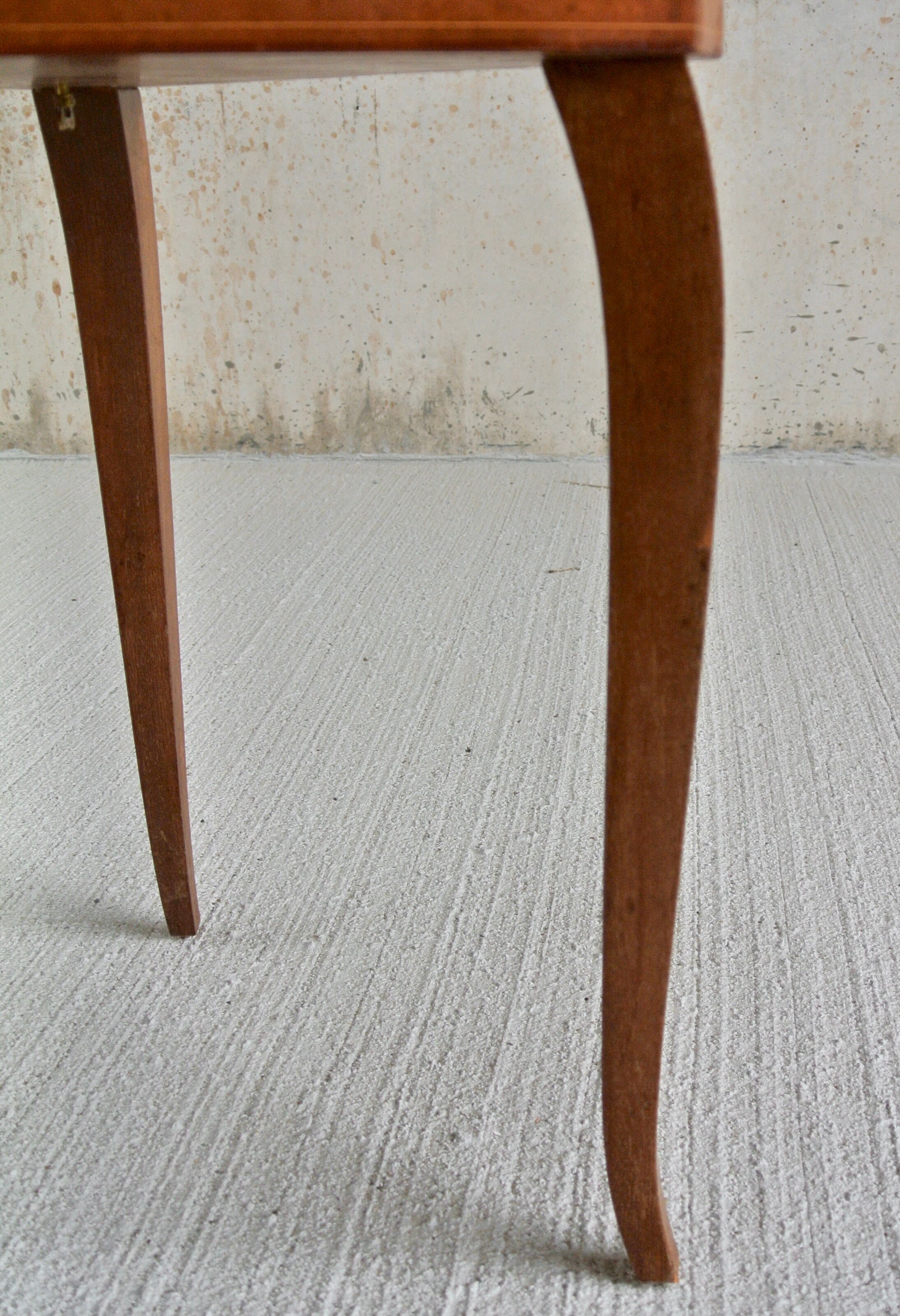 Musical coffee table of triangular shape, fruit wood, tray and feet with marquetry décor