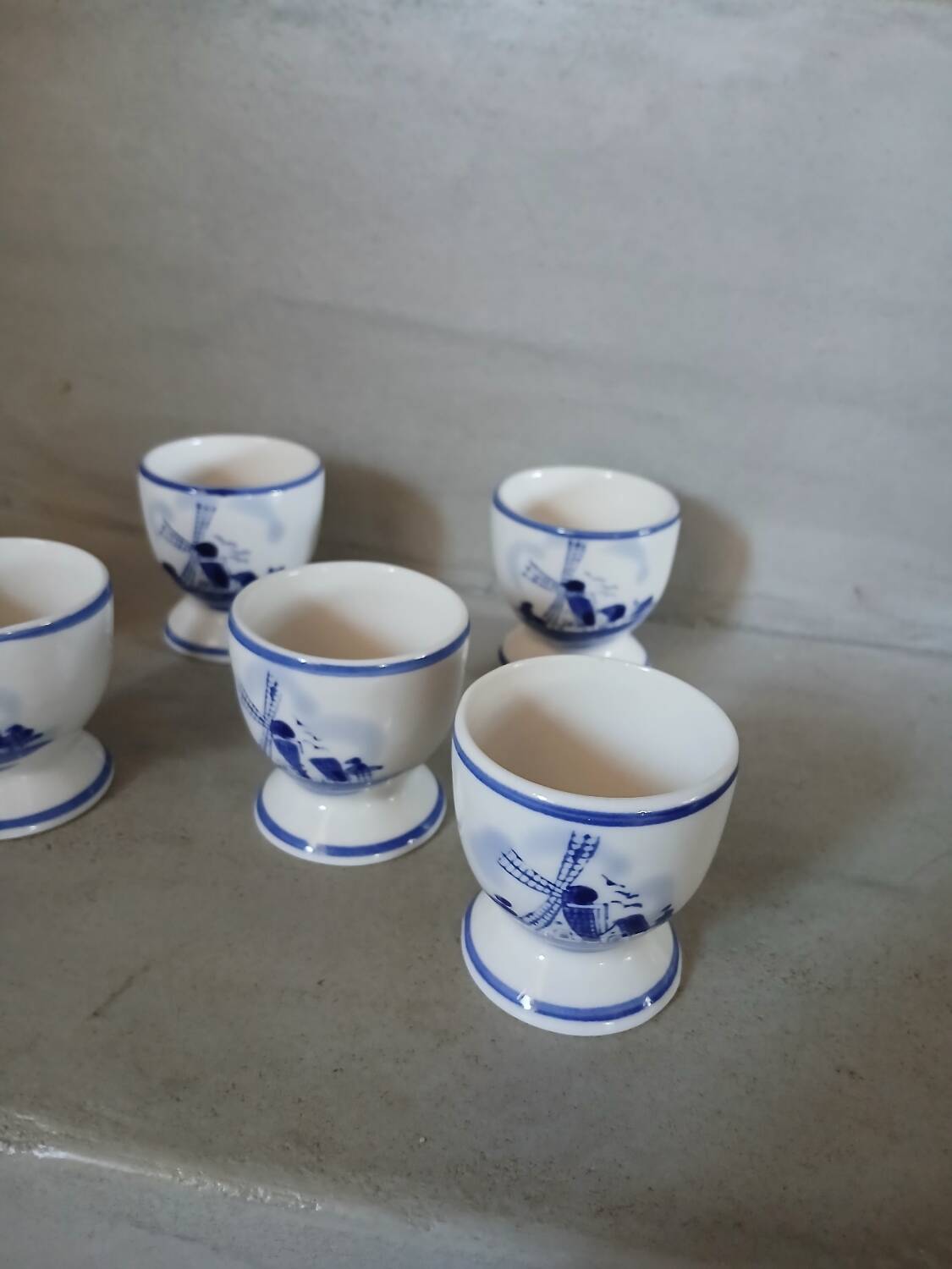 7 antique egg cups