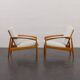 Pair of Kai Kristiansen Paperknife lounge chairs in teak and natural wool