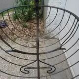 Former cradle in wrought iron