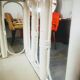 White rattan corner shelf