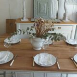 Farmhouse table with pearl gray base and raw wood top.