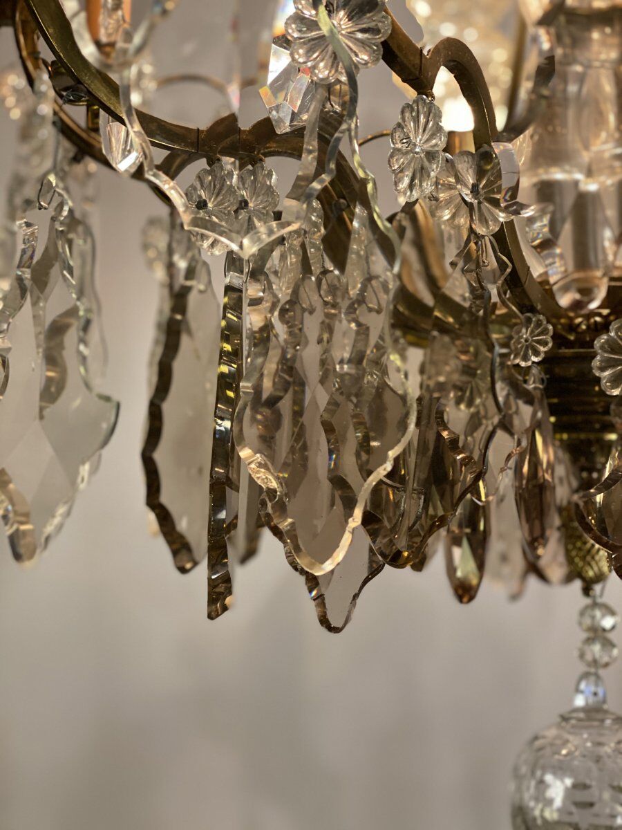 Golden bronze luster garnished with transparent and mordoréed pampilles