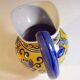 Jug pitcher with blue flowers
