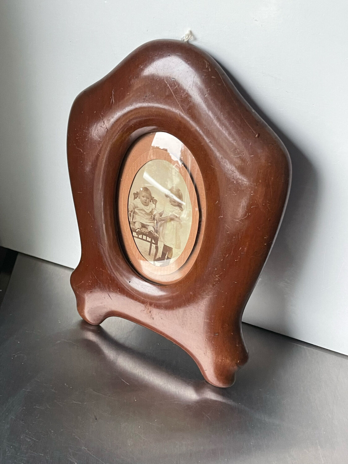 Art nouveau mahogany wooden frame measurements 27.5 cm x 20 cm  convex glass