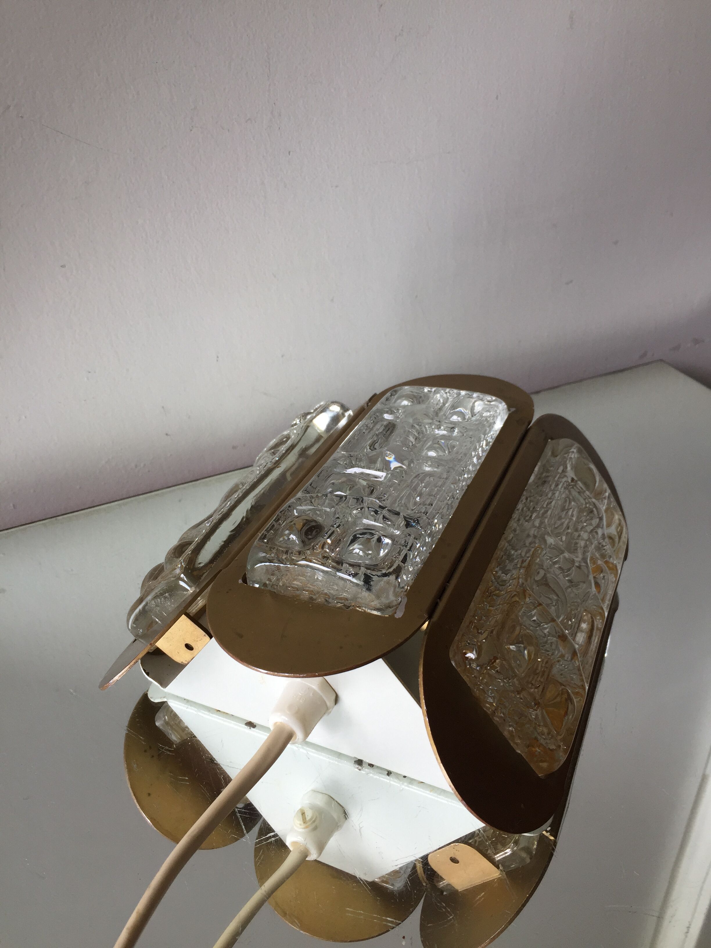 Scandinavian midcentury wall light in crystal and mat gold colored metal