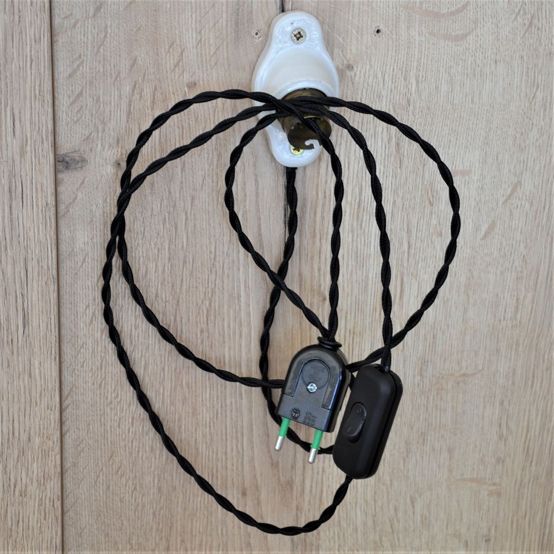 Oval porcelain hook to plug into socket