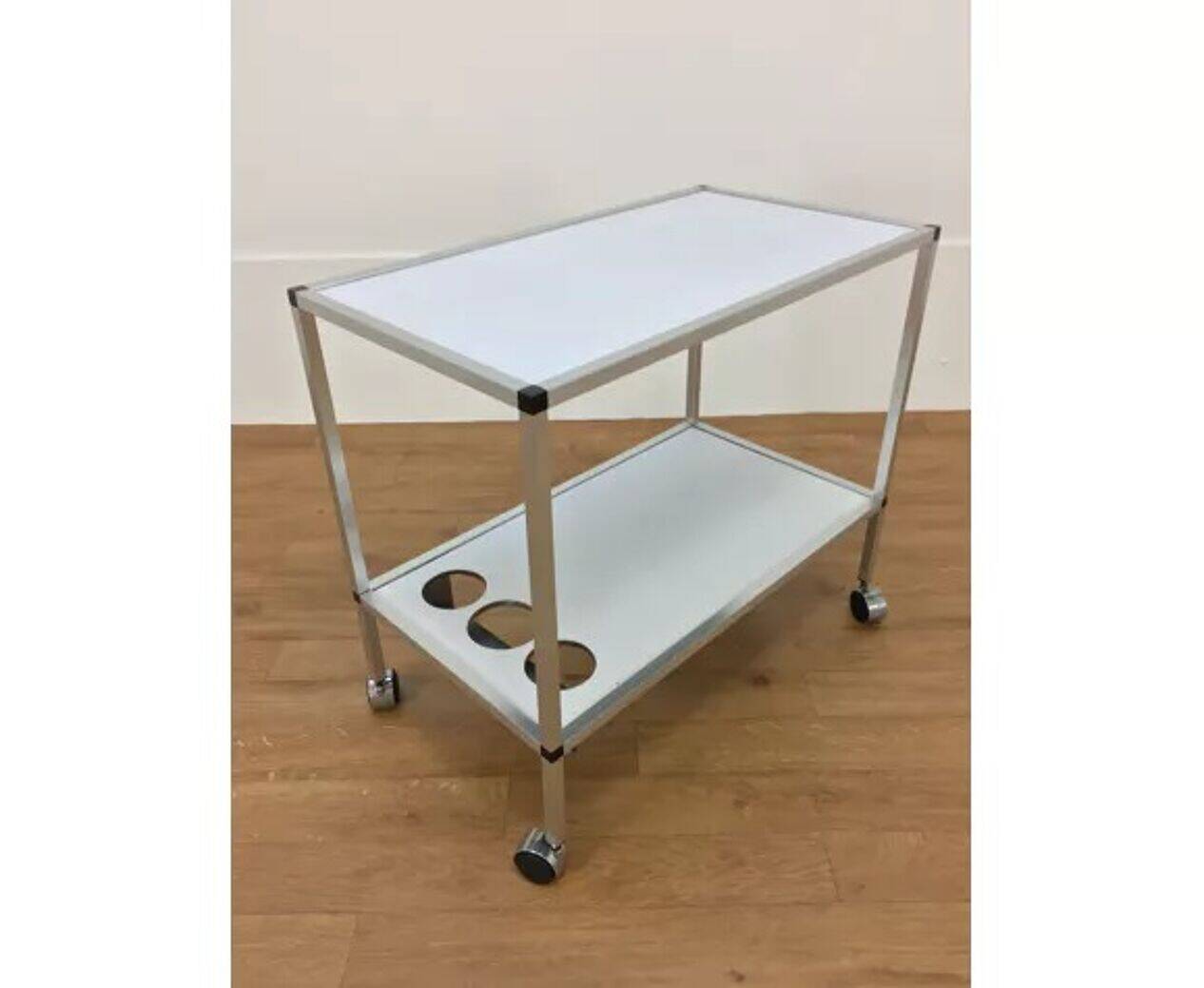 70s minimalist Space Age dessert, brushed aluminium