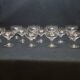 12 old champagne glasses in blown and engraved glass