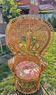 Vintage peacock chair in sculptural blonde rattan, fan back from the 1970s.