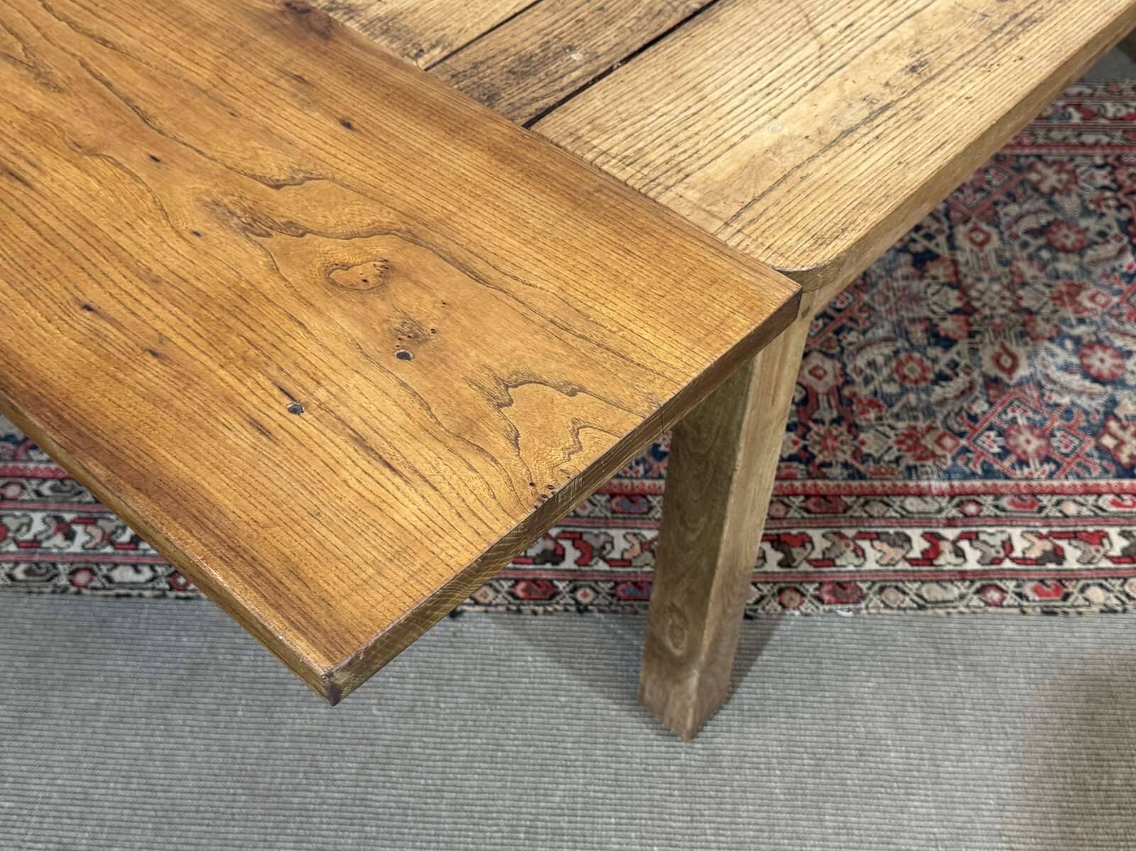 Extendable oak table from the 1930s with Gothic decoration.