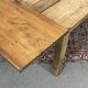 Extendable oak table from the 1930s with Gothic decoration.
