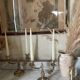 Pair of rocaille candlesticks in gilded bronze