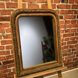 Mirror with moldings on the frame
