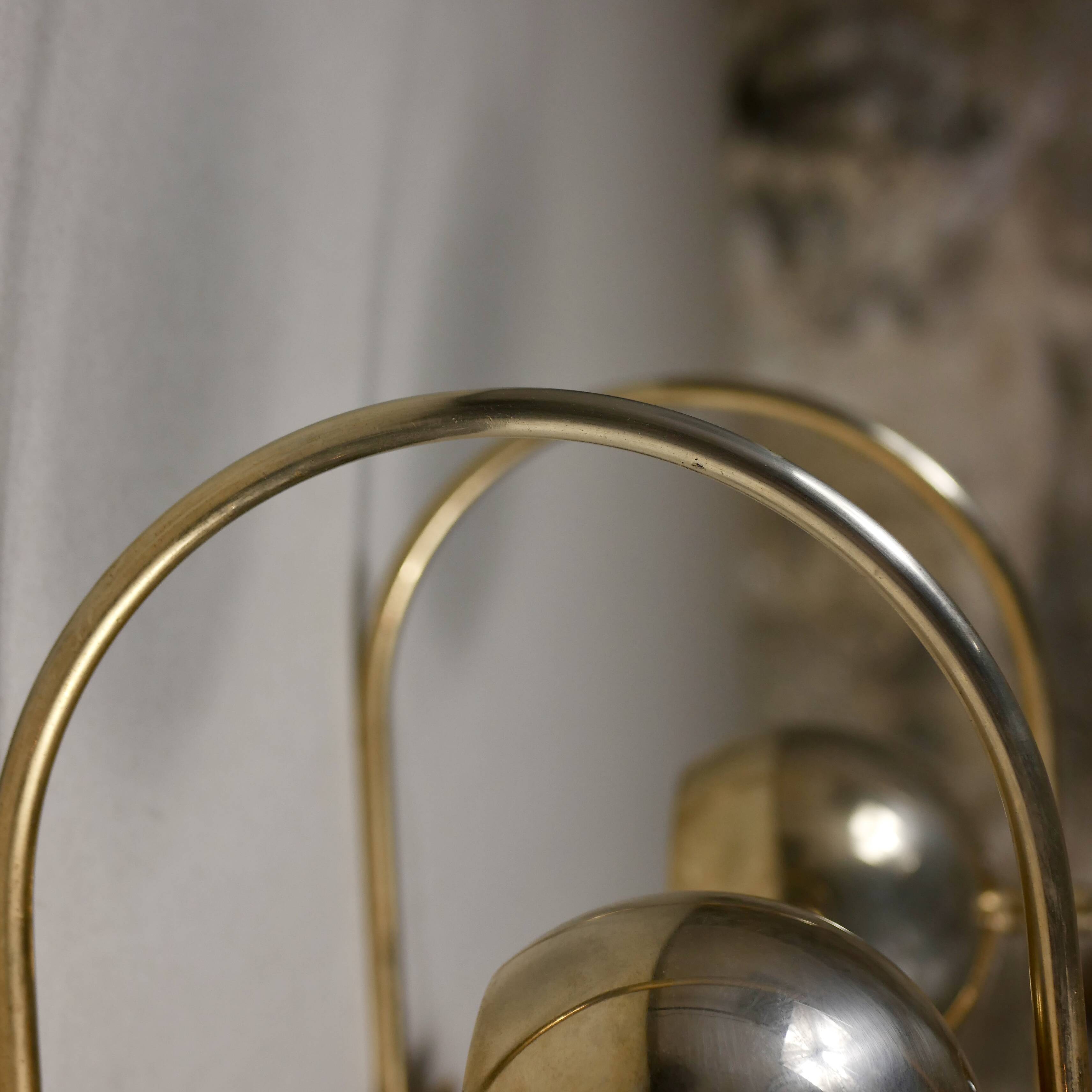 Pair of brass eyeball wall lights