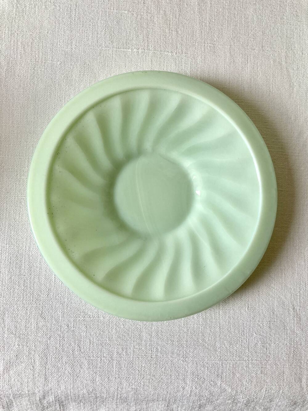 Pressed glass cups and saucers, 1950s