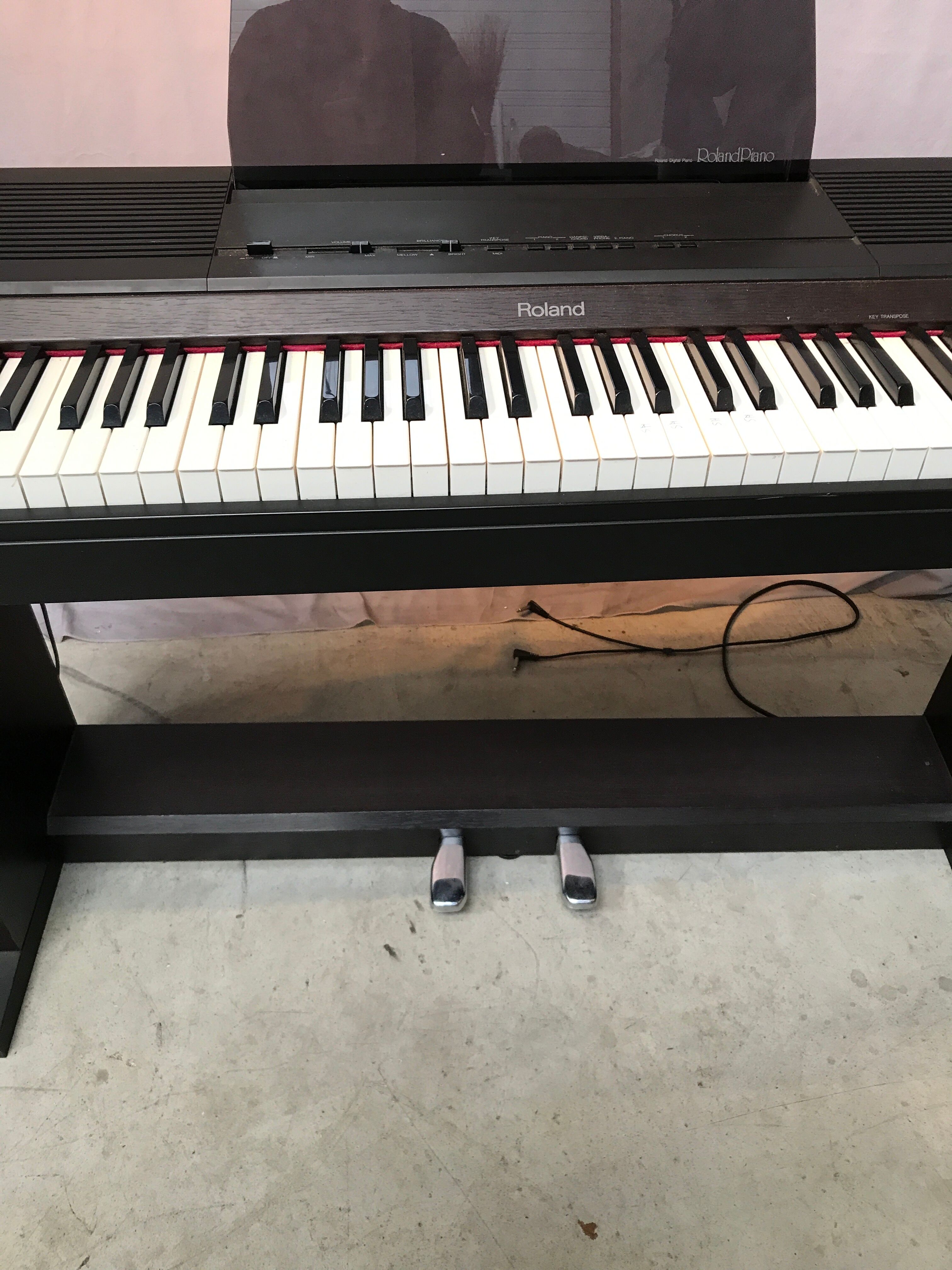Roland HP 700 keyboard and its stand with pedal