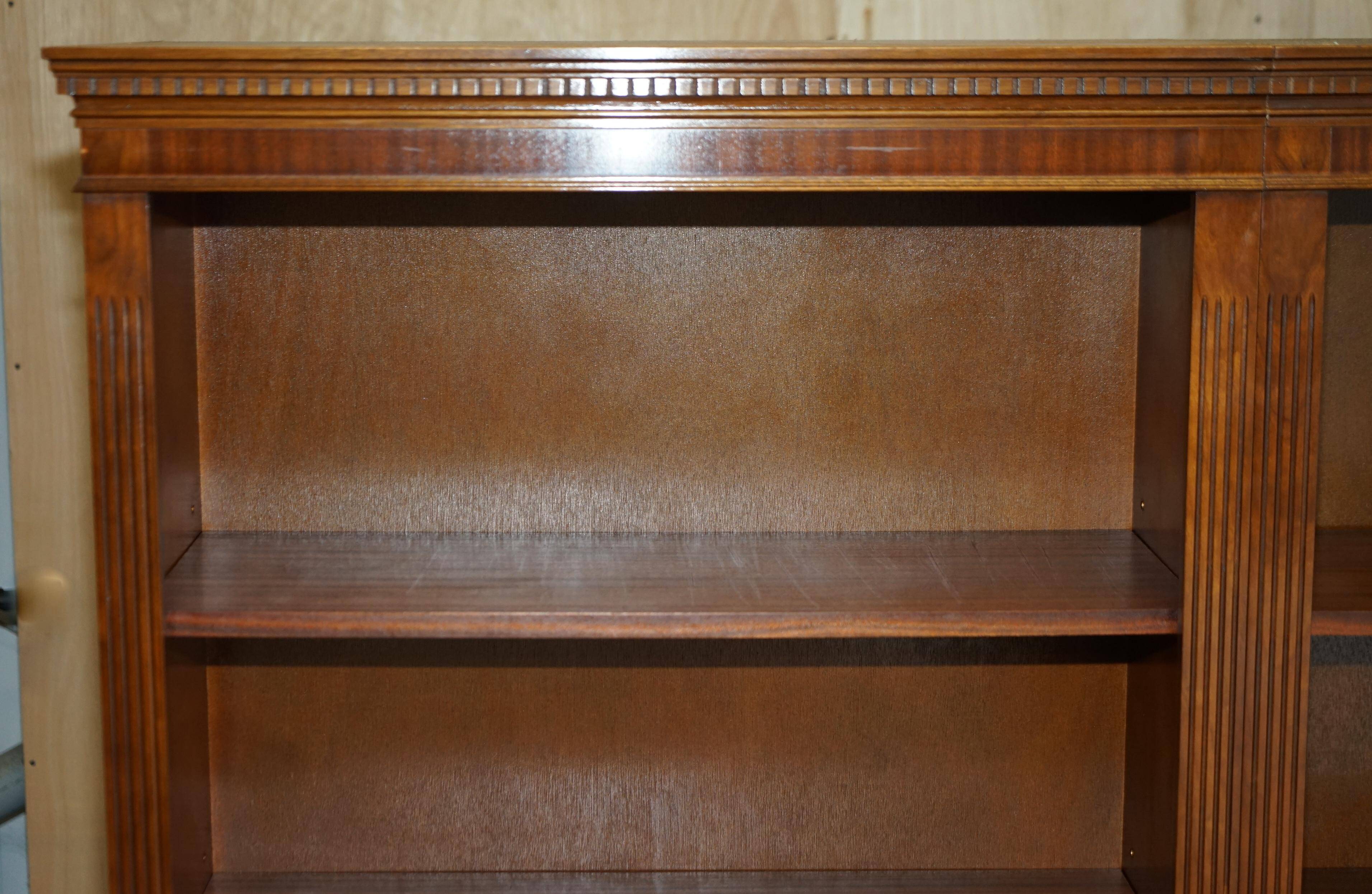 Corner library made of flamed hardwood, in 3 parts.
