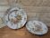 Set of 2 antique decorative plates with cornucopias
