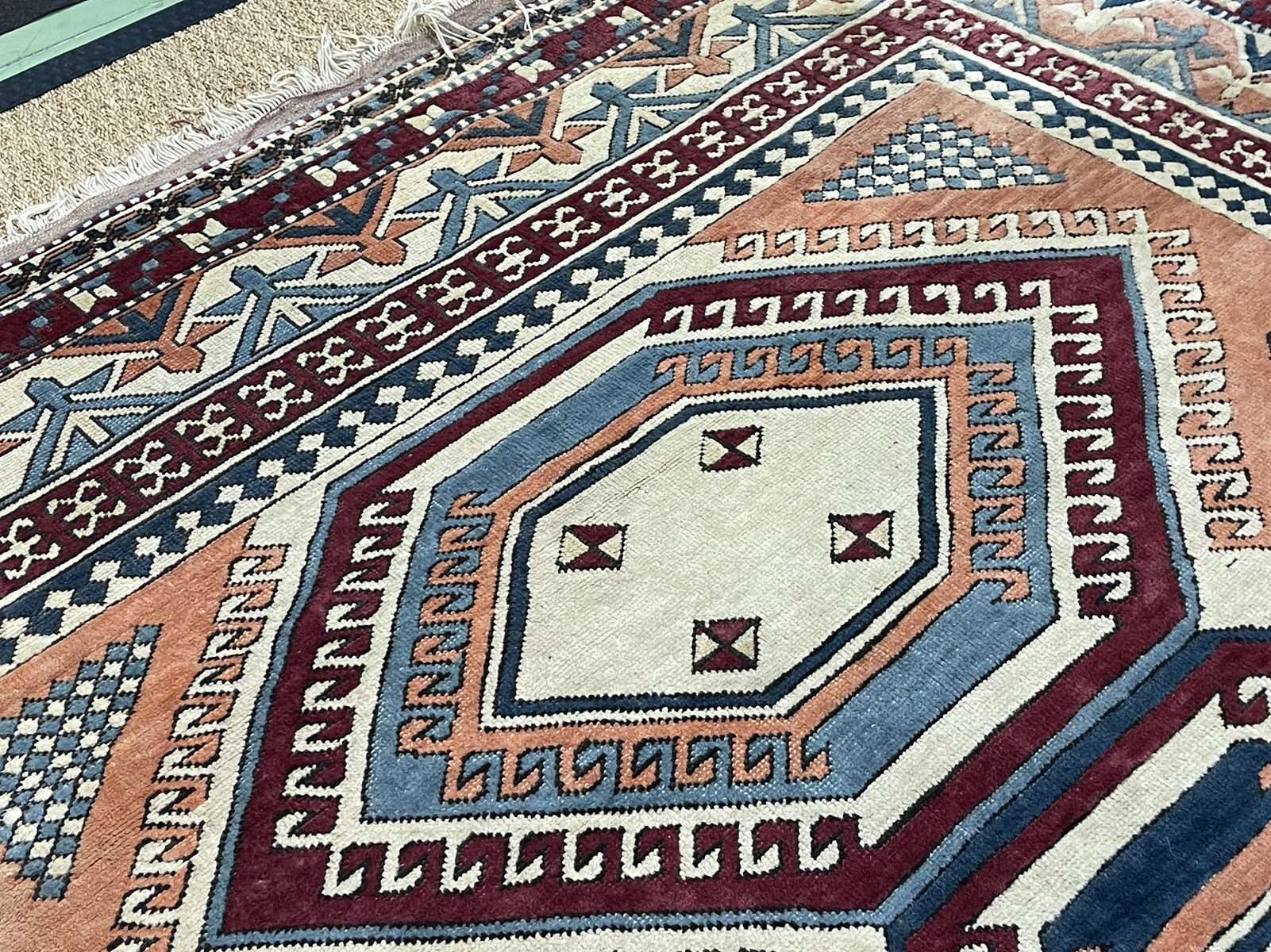 Large handmade wool Iranian carpet