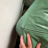 New armchair in vintage green leather