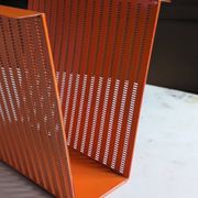 Vintage metal magazine rack in perforated orange/Mathieu Mategot style/70s