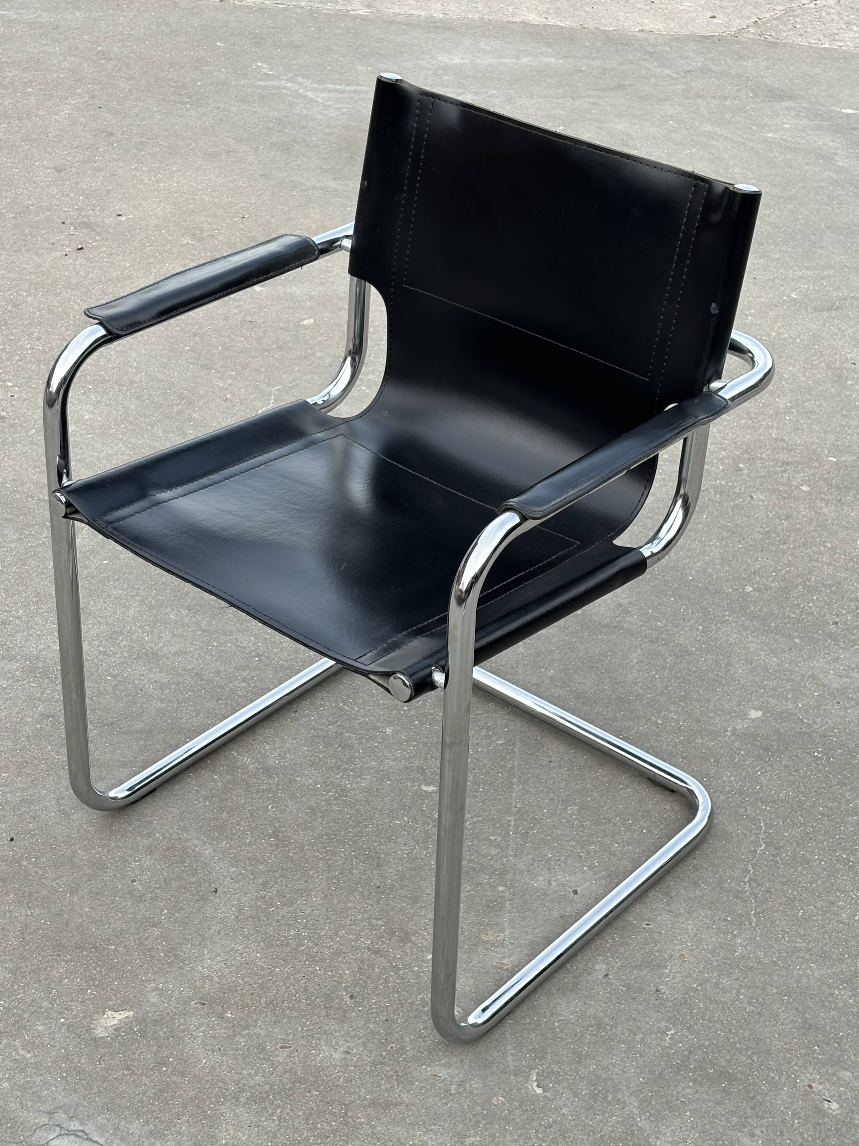 Set of 4 design cantilever chairs black and chrome design made in Italy