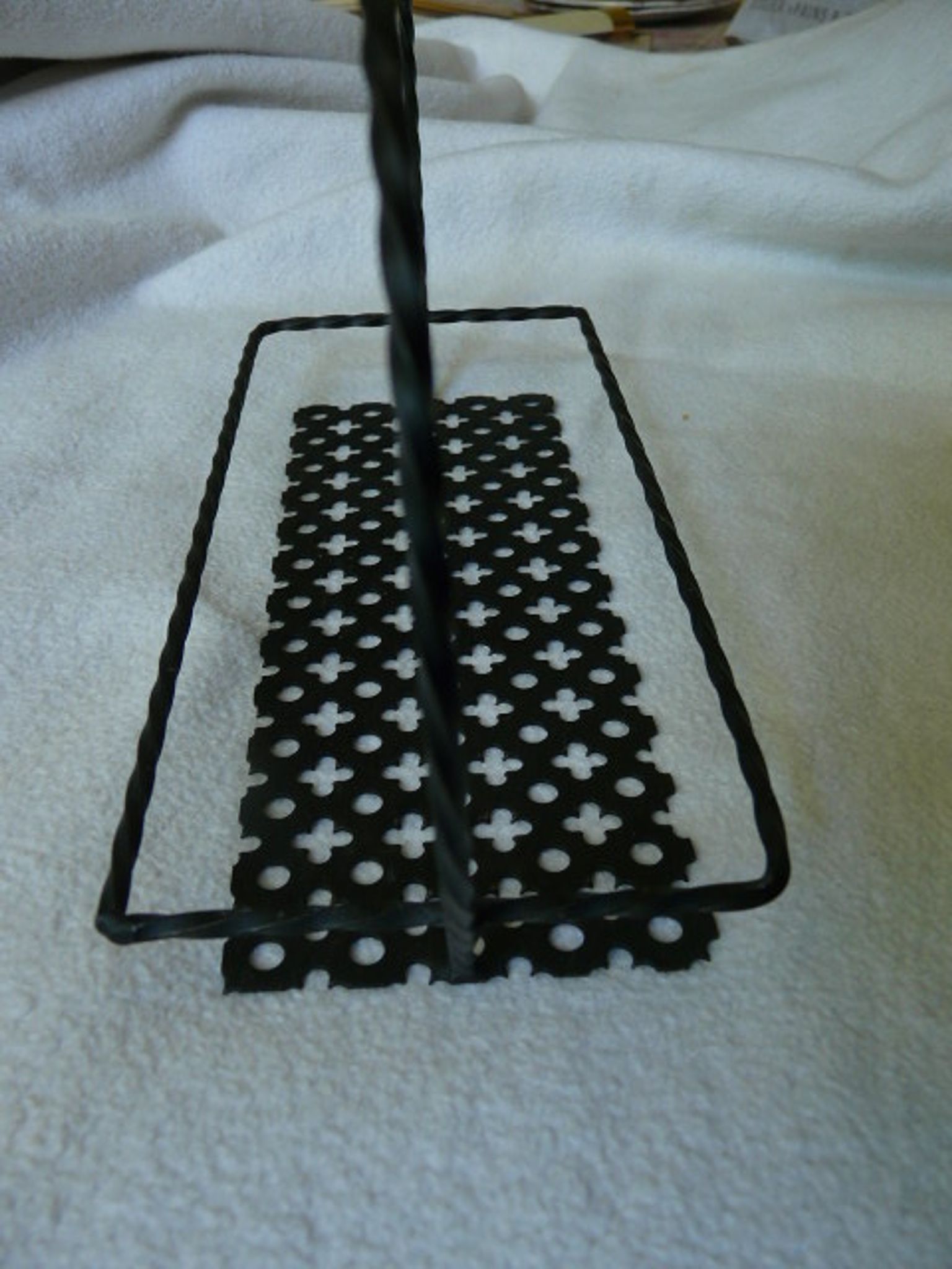 Tray in black perforated metal