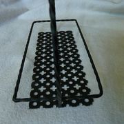 Tray in black perforated metal
