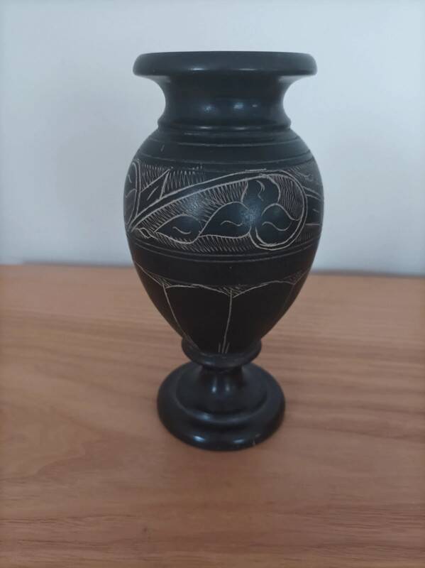 Black vase signed