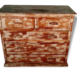 Commode en teck patinée.