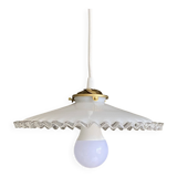 Old lampshade in white opaline glass with a wavy edge.