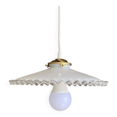 Old lampshade in white opaline glass with a wavy edge.