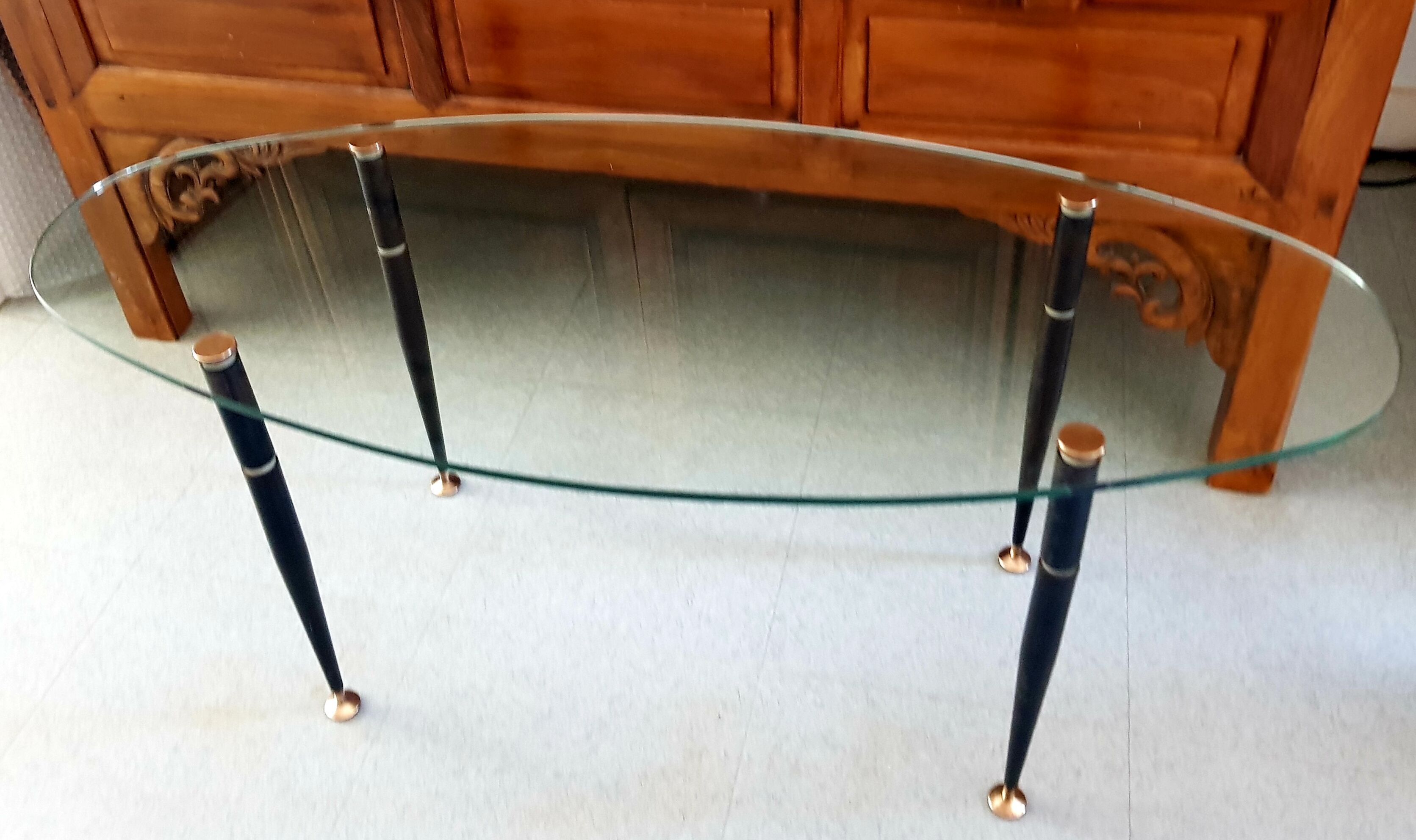 1950 oval coffee table in steel and brass glass