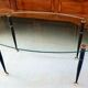 Table basse 1950 ovale en verre acier et laiton
