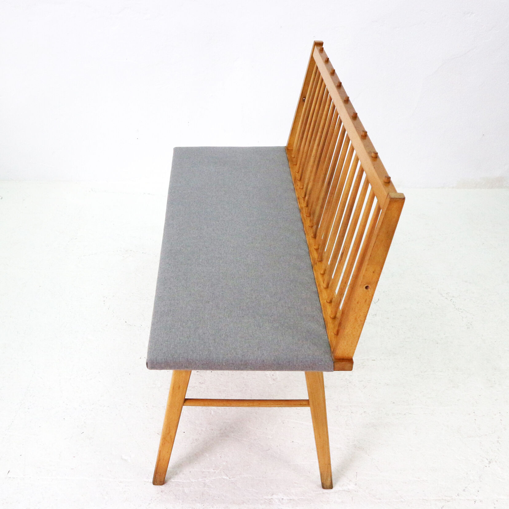 Reupholstered beechwood bench, 1950