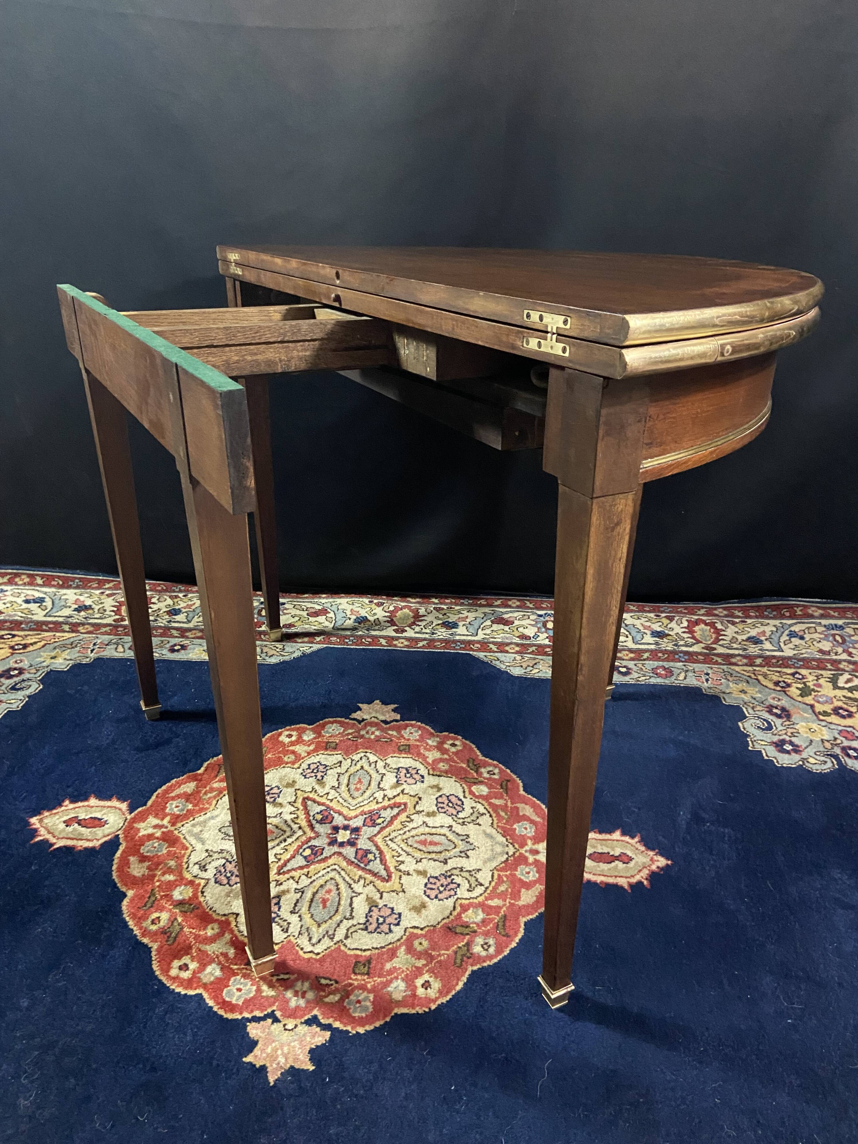 Console table demi-lune 19th century Louis XVI modular foldable top in mahogany.