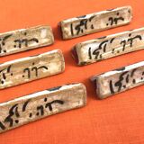 6 glazed ceramic knife rests from Nabeul, Atelier el-Kharraz.