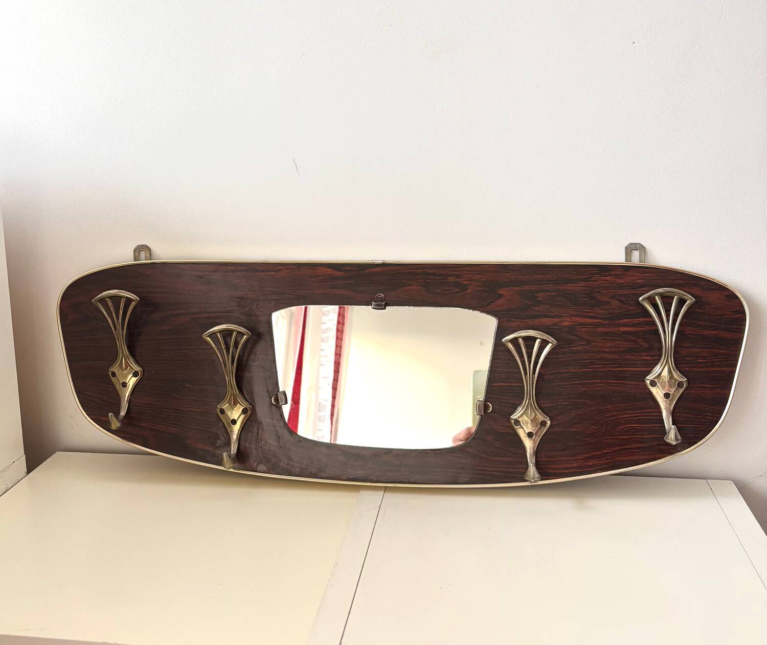 Wood and brass coat rack, 1960